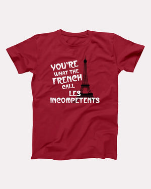 Les Incompétents T-Shirt, flat lay on grey
