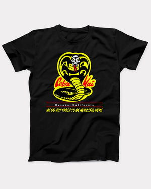 Cobra Kai T-Shirt, flat lay on grey