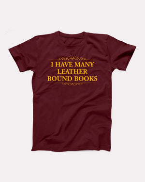 I Have Many Leather Bound Books T-Shirt, flat lay on grey
