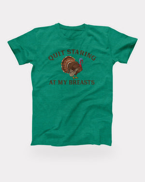 Quit Staring At My Breasts T-Shirt in Heather Kelly, flat lay on grey