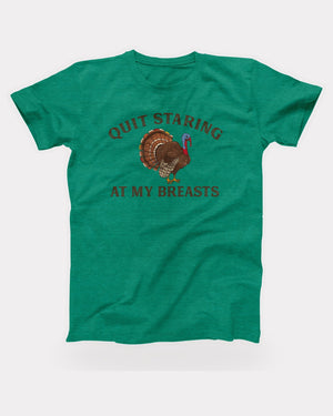 Quit Staring At My Breasts T-Shirt in Heather Kelly, flat lay on grey