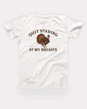 Quit Staring At My Breasts T-Shirt in White, flat lay on grey