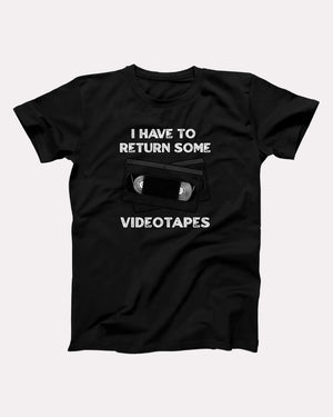 I Have To Return Some Videotapes T-Shirt, flat lay on grey
