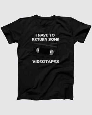 I Have To Return Some Videotapes T-Shirt, flat lay on grey