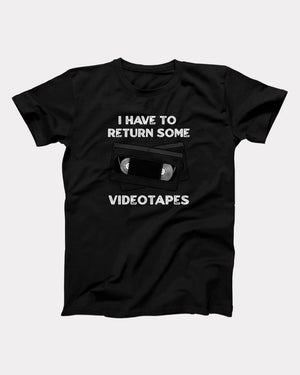 I Have To Return Some Videotapes T-Shirt, flat lay on grey