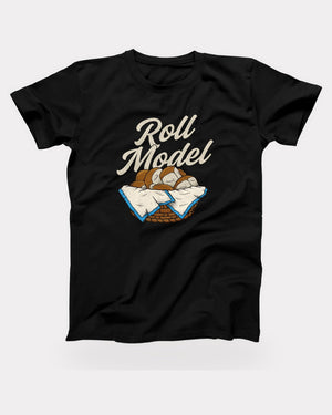 Roll Model T-Shirt in Black, flat lay on grey
