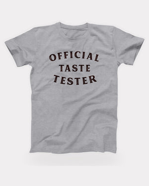 Official Taste Tester T-Shirt in Athletic Heather, flat lay on grey