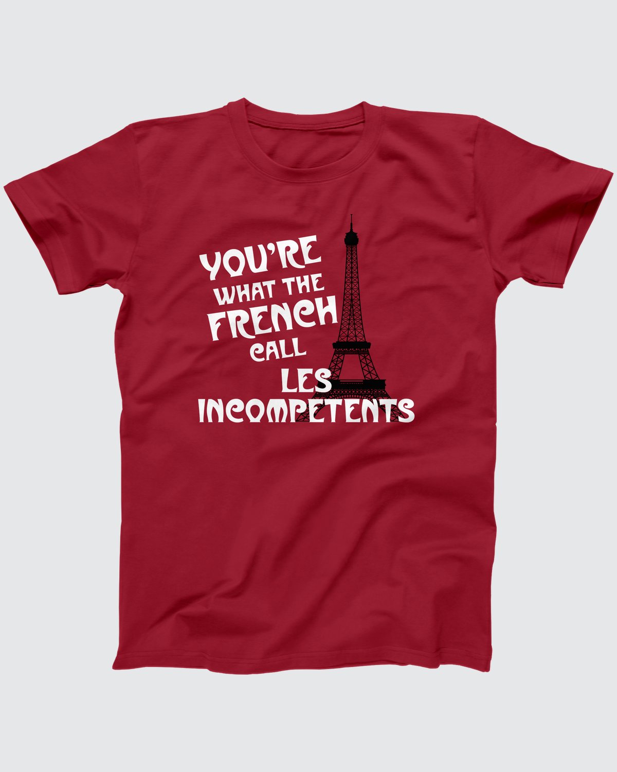 Les Incompétents T-Shirt, flat lay on grey