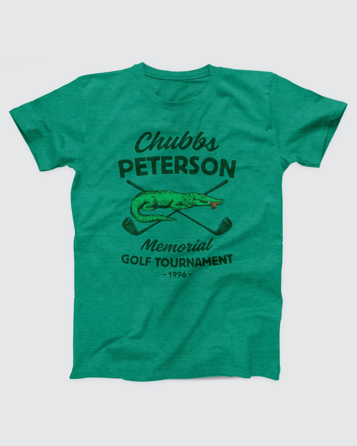 Chubbs Peterson Memorial Golf Tournament T-Shirt, flat lay on grey