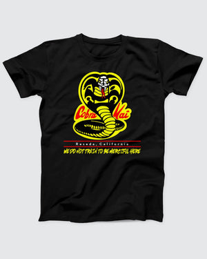 Cobra Kai T-Shirt, flat lay on grey