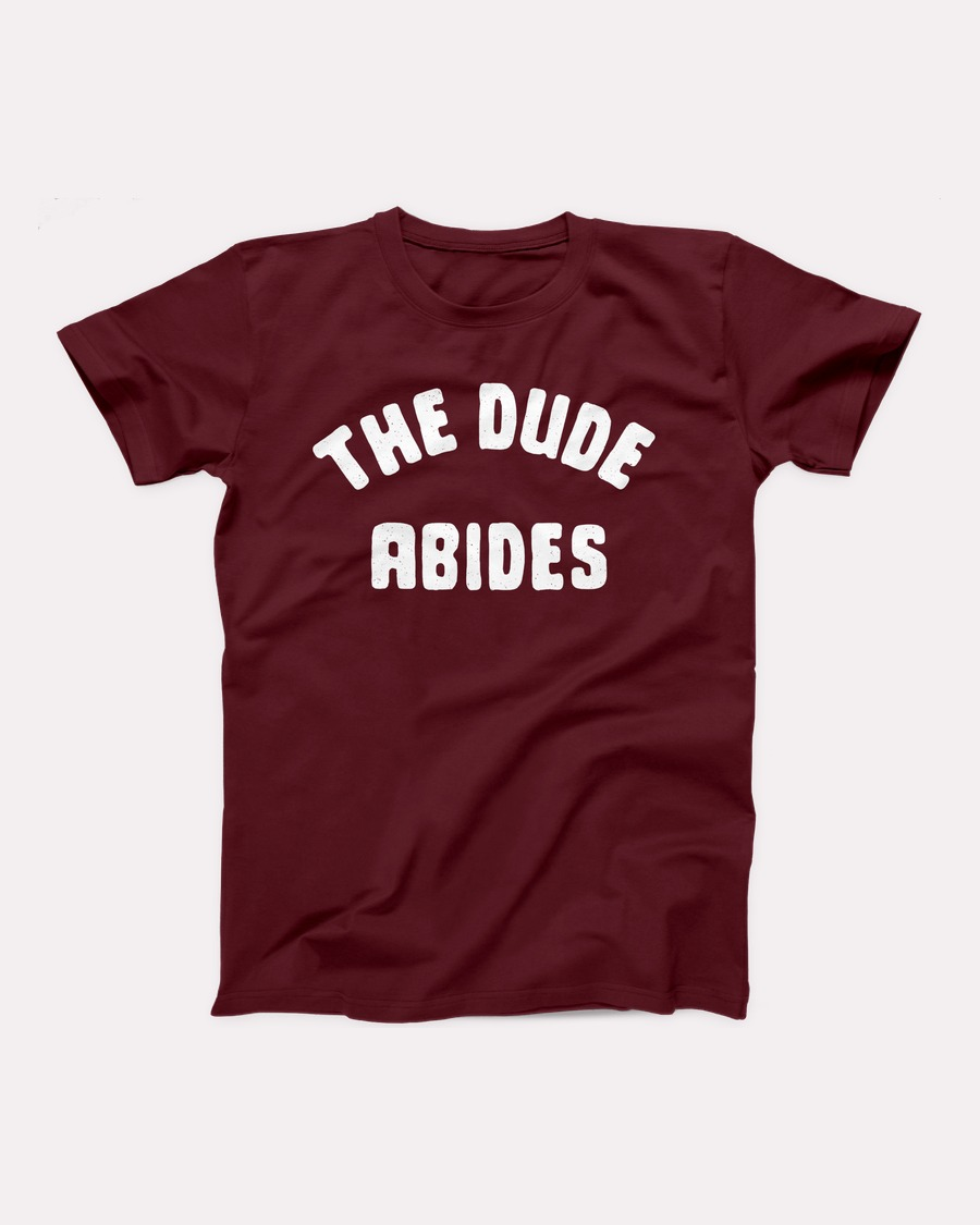 The Dude Abides T-Shirt, flat lay, Maroon