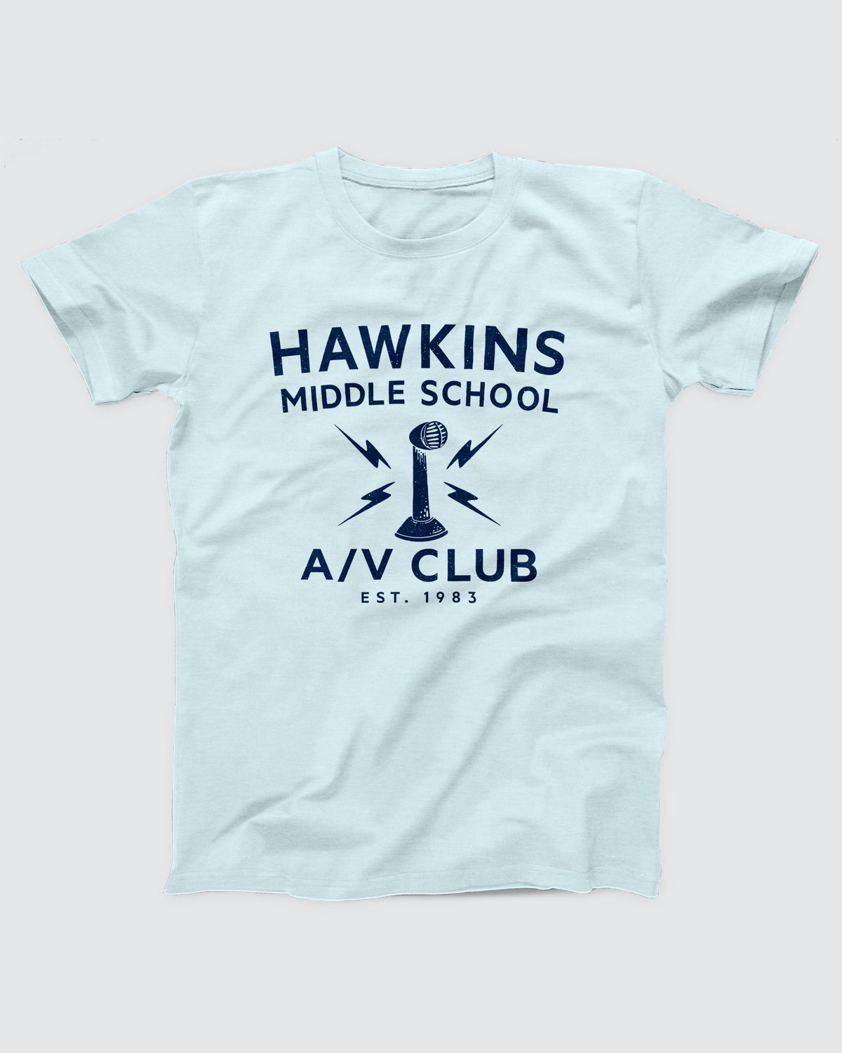 Hawkins Middle School A/V Club T-Shirt, flat lay on grey