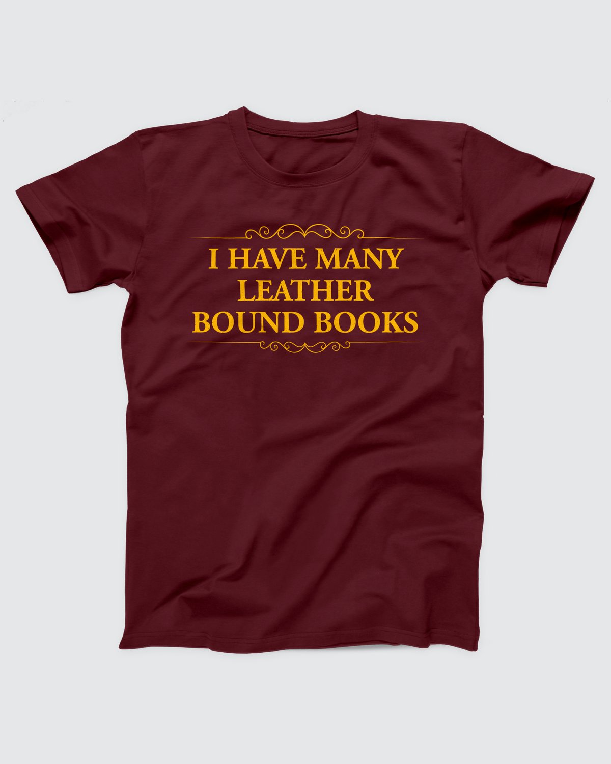 I Have Many Leather Bound Books T-Shirt, flat lay on grey