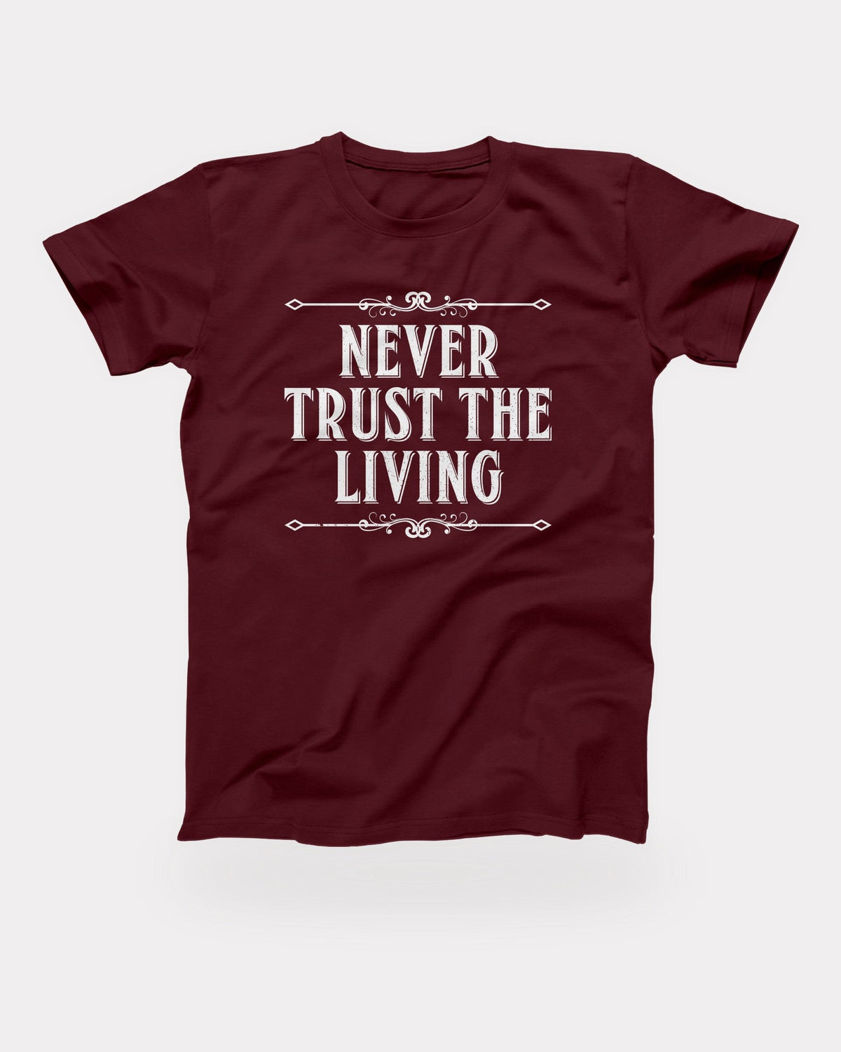 Never Trust the Living T-Shirt in Maroon, flat lay on grey