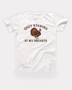 Quit Staring At My Breasts T-Shirt in White, flat lay on grey