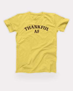 Thankful AF T-Shirt in Maize Yellow, flat lay on grey