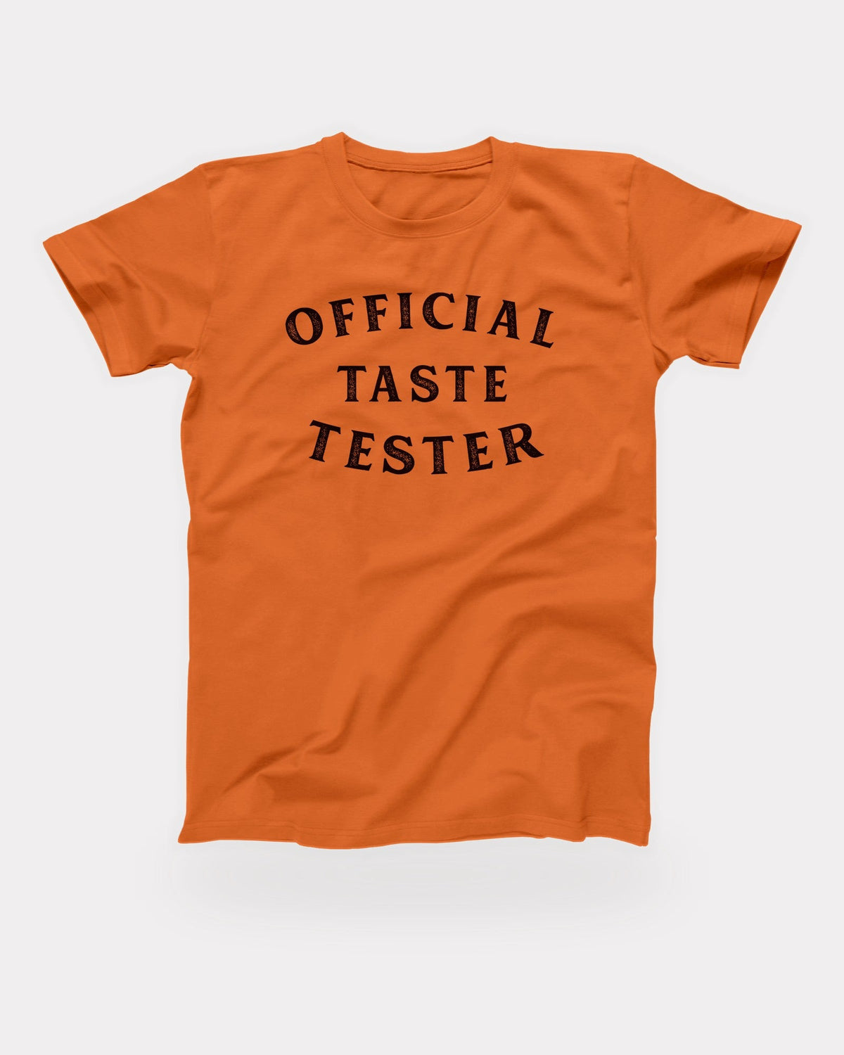 Official Taste Tester T-Shirt in Orange, flat lay on grey