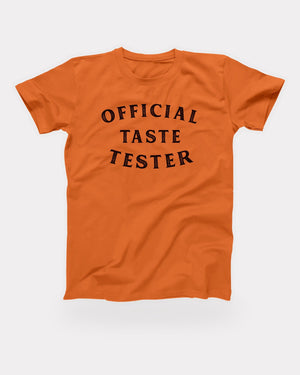 Official Taste Tester T-Shirt in Orange, flat lay on grey