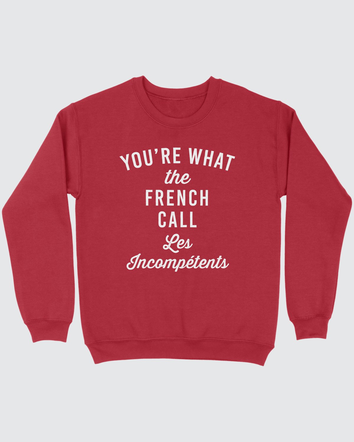 Les Incompétents Ugly Sweater, flat lay on grey